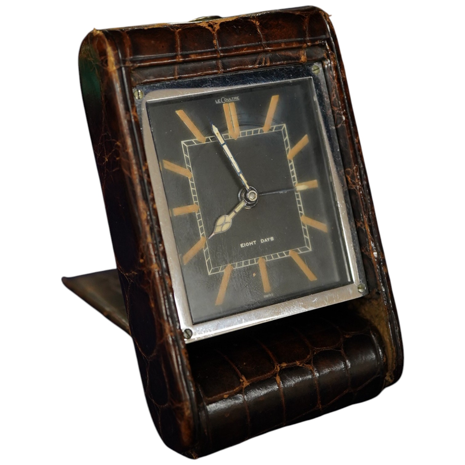 A Jaeger Le Coultre 8 day faux crocodile travelling timepiece